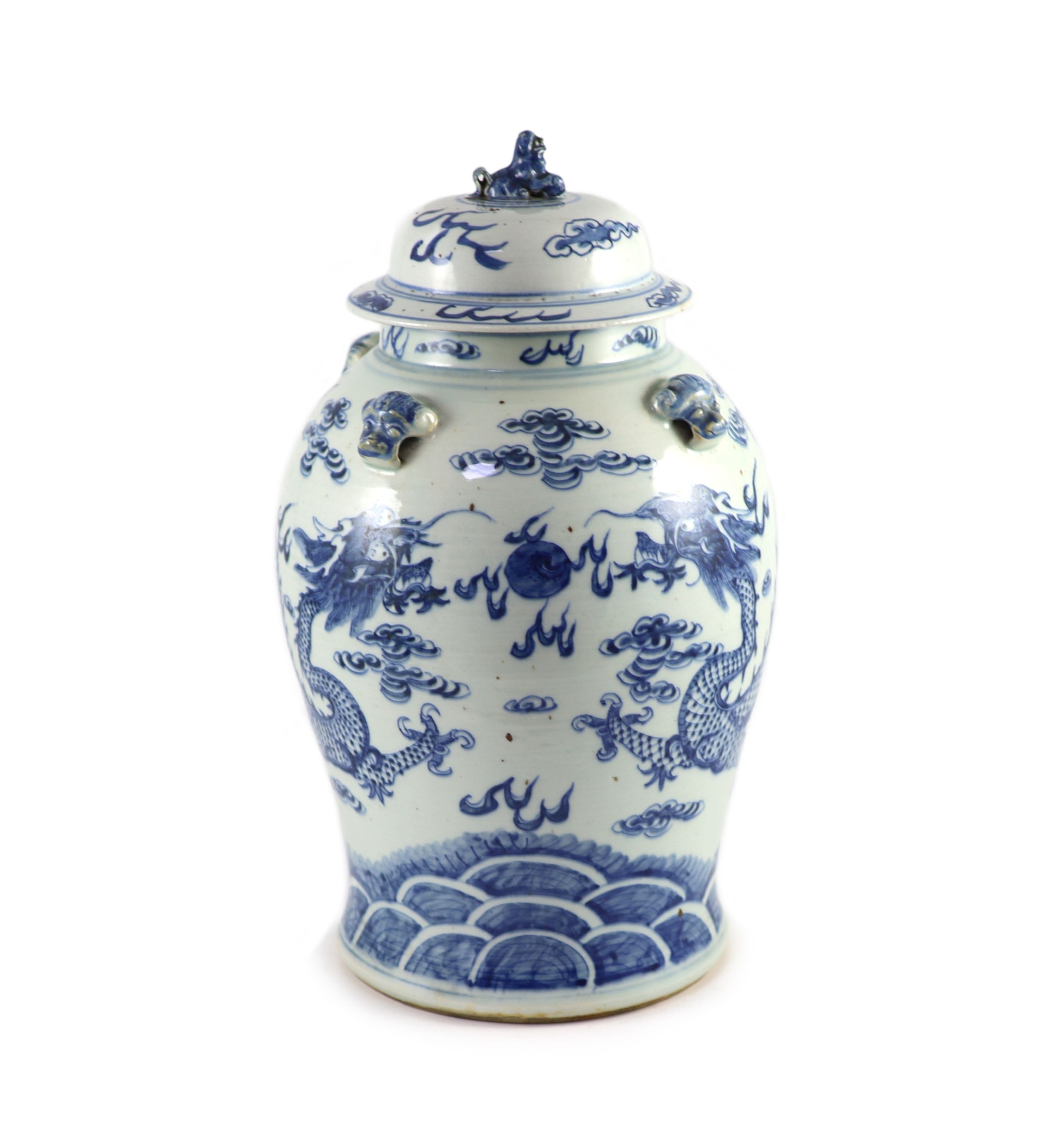 A Chinese blue and white ‘dragon’ vase and cover, Daoguang period (1821-50), 43.5 cm high